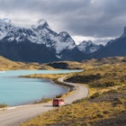 A van driving in Torres del Paine National Park, Chilean Patagonia
